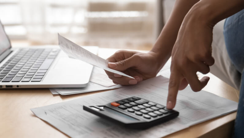 person calculating mortgage payment